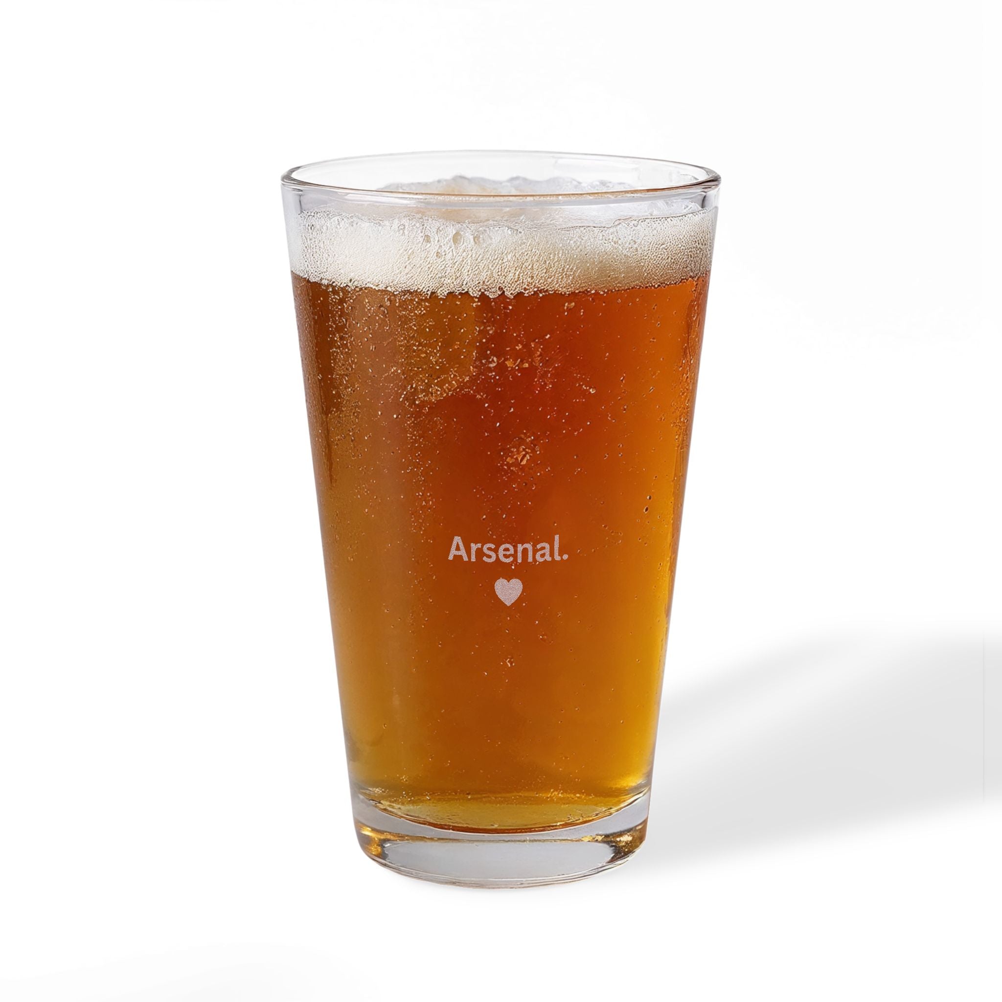 Pint glass filled with beer and 'Arsenal.' logo on a white background