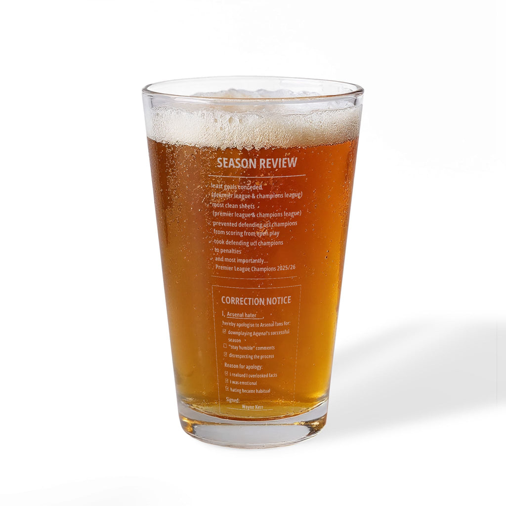 Arsenal themed pint glass with beer and printed text on a white background